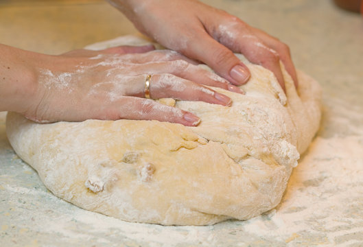 Kneading yeast dough.