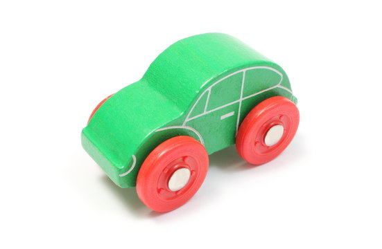 Green toy car isolated on white background