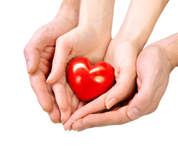 Valentine Heart in Man and Woman Hands isolated on white