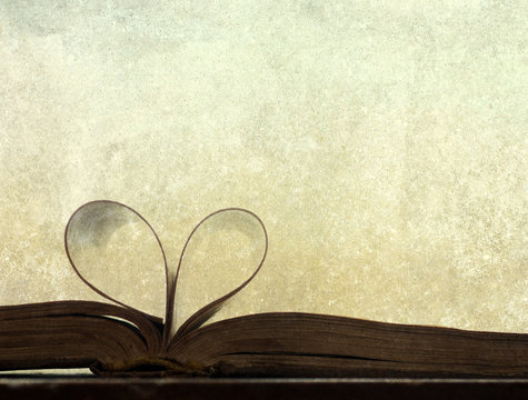 Vintage photo of heart shaped book pages