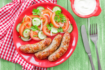 Sausages and salad