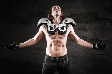 Foto op Plexiglas Bare chested american football player © guerrieroale