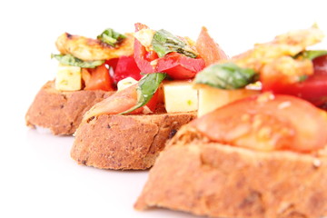 Sandwiches with chicken, tomato, cheese and bell pepper