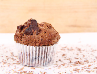 Lemon muffin on a wooden background