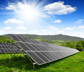 Solar energy panels against sunny sky