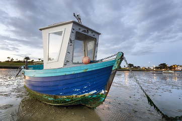 Blue Fishing Boat at Dawn