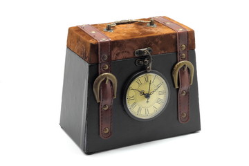 Vintage leather box with clock isolated on white background