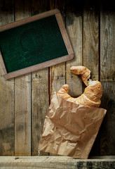 Croissant, coffee and a blank school slate