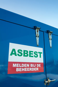 Dutch asbestos sign on a blue container