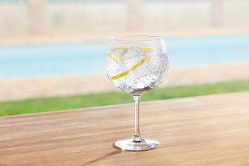 Gin and tonic cocktail on poolside