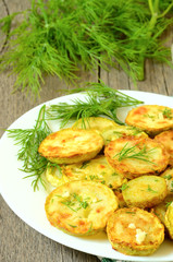 Fried zucchini with dill