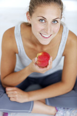 Woman holding an apple