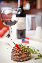 Ruddy steak and red wine