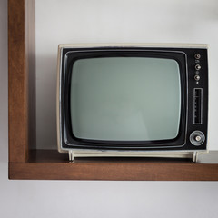 Vintage television on a shelf