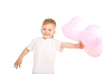 Boy giving  heart balloons
