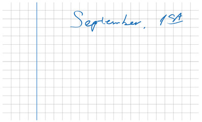 hand-writing first september date on clean white notebook sheet