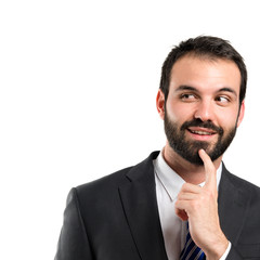 business man thinking over white background