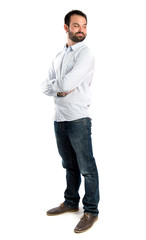 Fototapeta premium Men with his arms crossed over isolated background