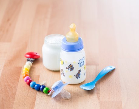 Pacifier, baby milk and yoghurt