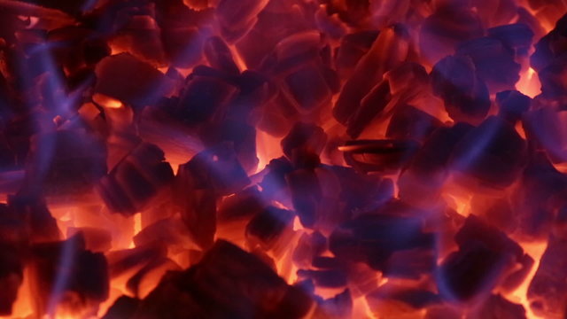 Seamless loop of ember in a fireplace