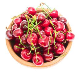 Cherry in bowl isolated on white background