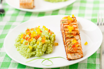 Creamy avocado rice with grilled salmon