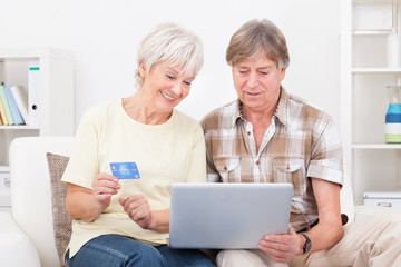 Senior Couple Shopping Online