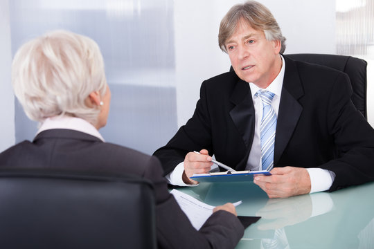 Two Businesspeople In Meeting