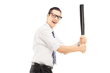 Person with a baseball bat prepared to strike