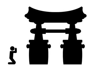 Homme priant à coté d'une pagode