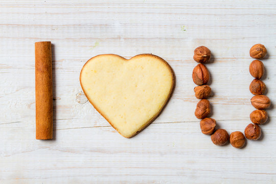 "I love you" sentence arranged with cookies and nuts