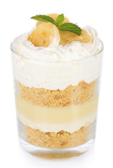 Delicious dessert with banana and caramel isolated on white
