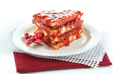 Sweet Belgium waffles with jam, isolated on white