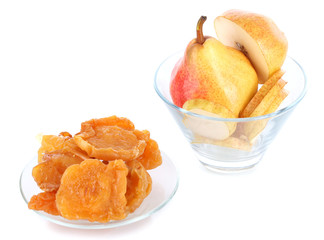 Dried pears in glass bowl, isolated on white