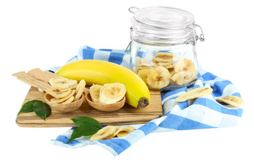 Fresh and dried banana slices in glass jar,