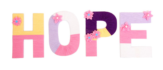 Word Hope created with brightly colored knitting yard isolated