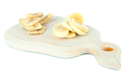 Fresh and dried banana slices, isolated on white