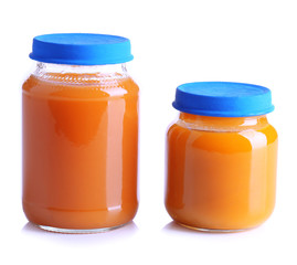 Baby food in glass jars, isolated on white