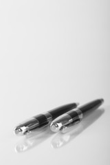 Two Black Luxury Metal Pens Isolated On White