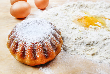 Easter yeast cake on wooden kitchen board