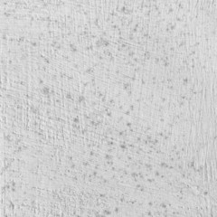 White background of natural cement or stone with spots