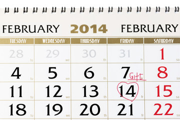 Calendar page with red heart on February 14 2014.