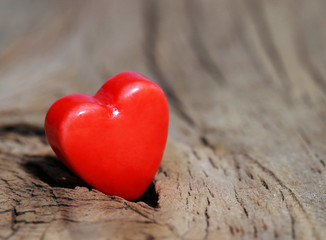 Fototapeta premium Valentines Day background. Hearts on Wooden Texture.