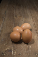 Eggs on wood background