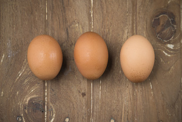 Eggs on wood background