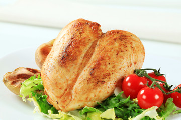 Chicken breast with potatoes and salad