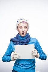 young cheerful woman holding sign on white background