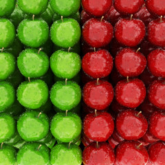 Row of red and green wet apples