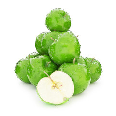 Juicy wet group of green apples on a white background.