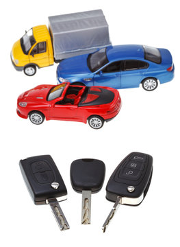 three vehicle keys and model cars
